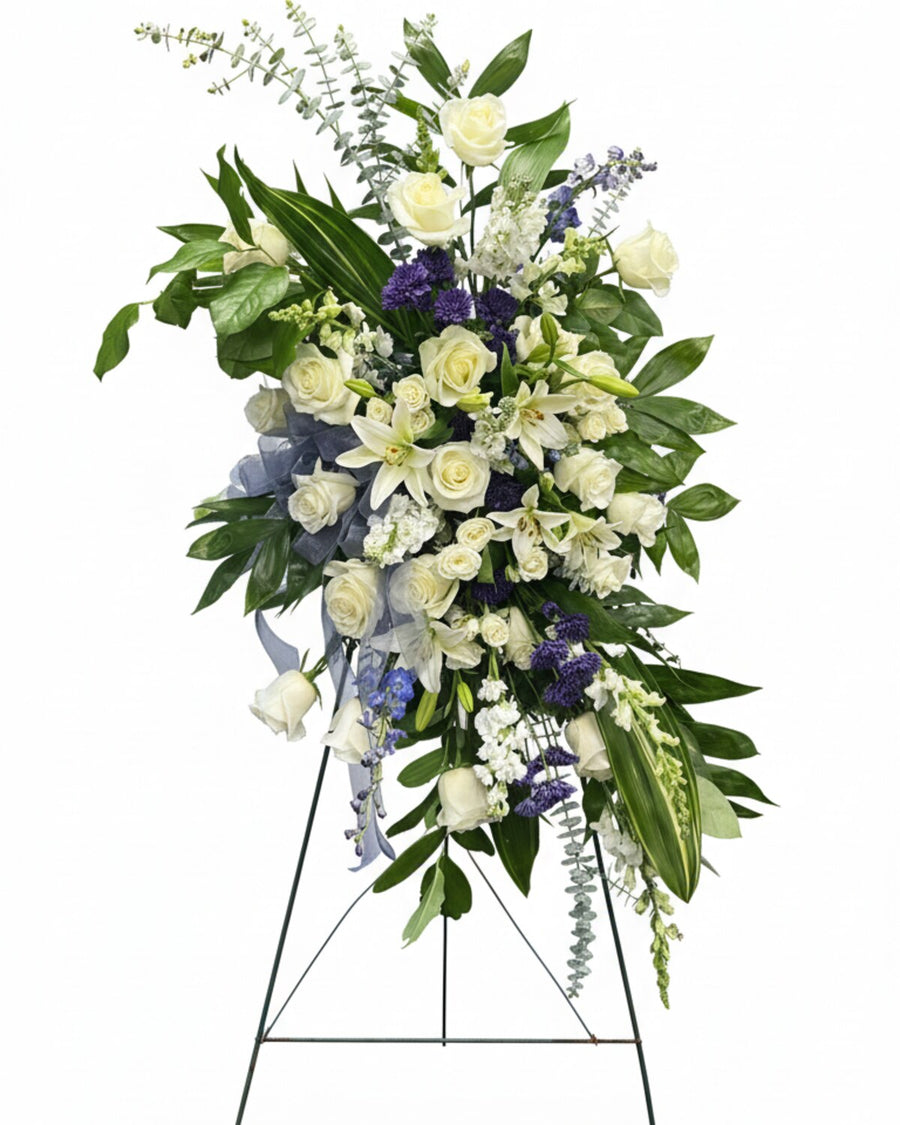 White Standing Spray — a standing spray of white roses, lilies, and hydrangea, timeless and serene