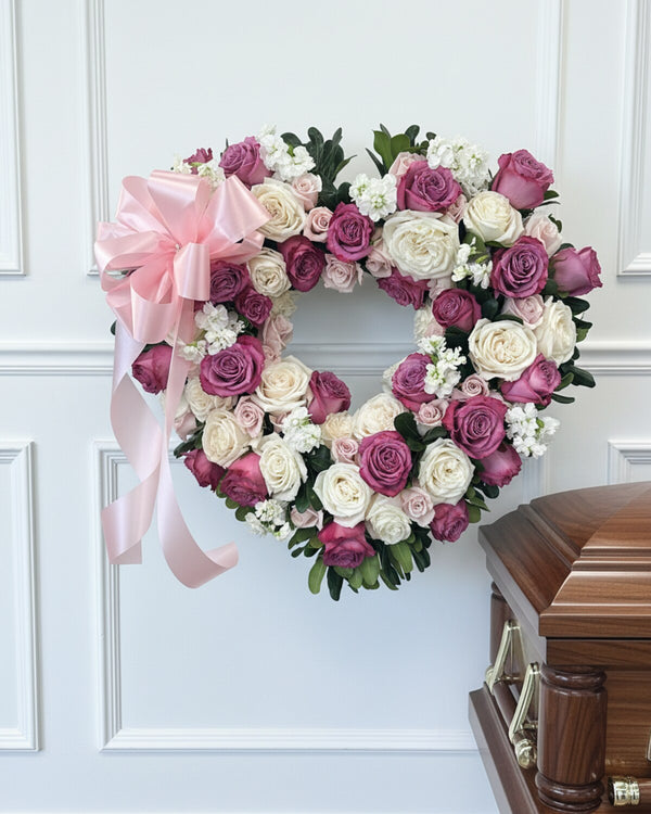 Lavender Heart — a heart-shaped tribute of soft lavender and white blooms