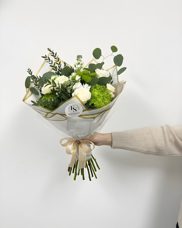 Green & White — a bouquet of crisp white roses, hydrangea, and lush green foliage