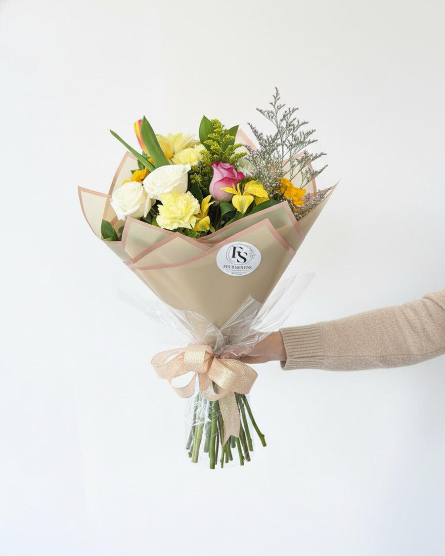 Market Day — a bouquet inspired by the local flower market, a lively mix of seasonal blooms in complementary colors and textures