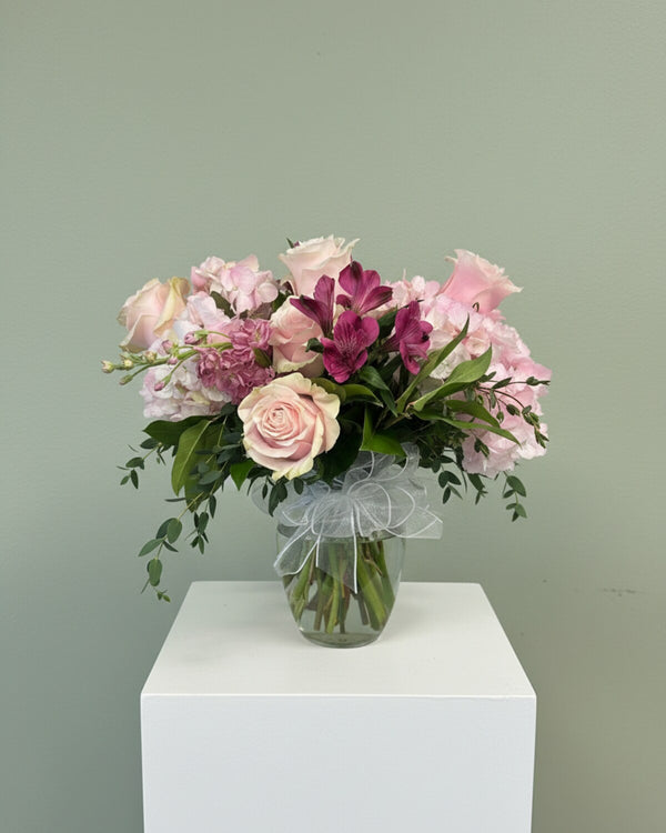 Soft Pink — a bouquet of soft pink roses and blush blooms with delicate greenery