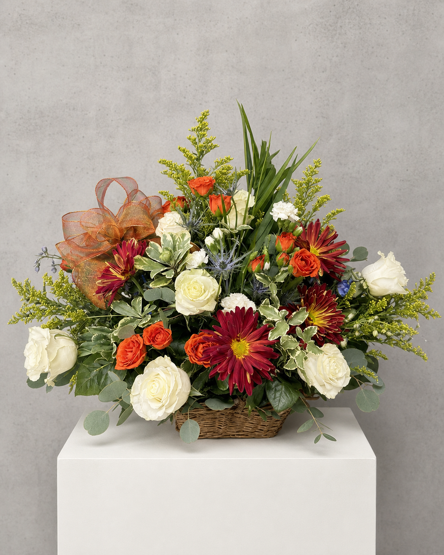 The Last Warm Day — fall basket of white roses, orange roses, red mums and golden solidago with a copper ribbon
